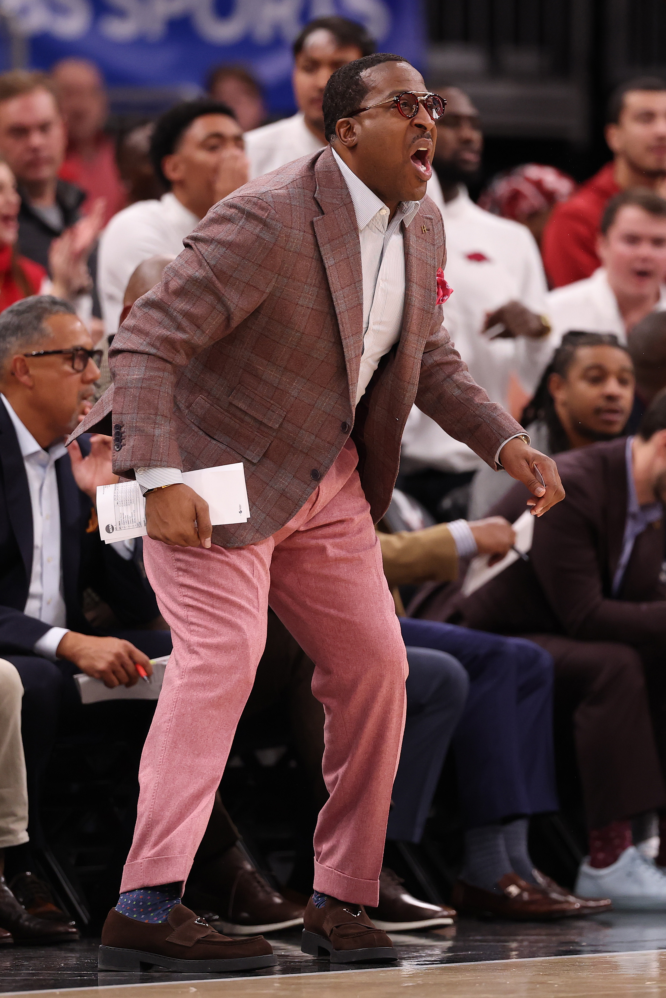 CHICAGO, ILLINOIS - NOVEMBER 27: Assistant coach Chin Coleman of the Arkansas Razorbacks reacts against the Duke Blue Devils during the first half of the CBS Thanksgiving Classic at the United Center on November 27, 2025 in Chicago, Illinois. (Photo by Michael Reaves/Getty Images)