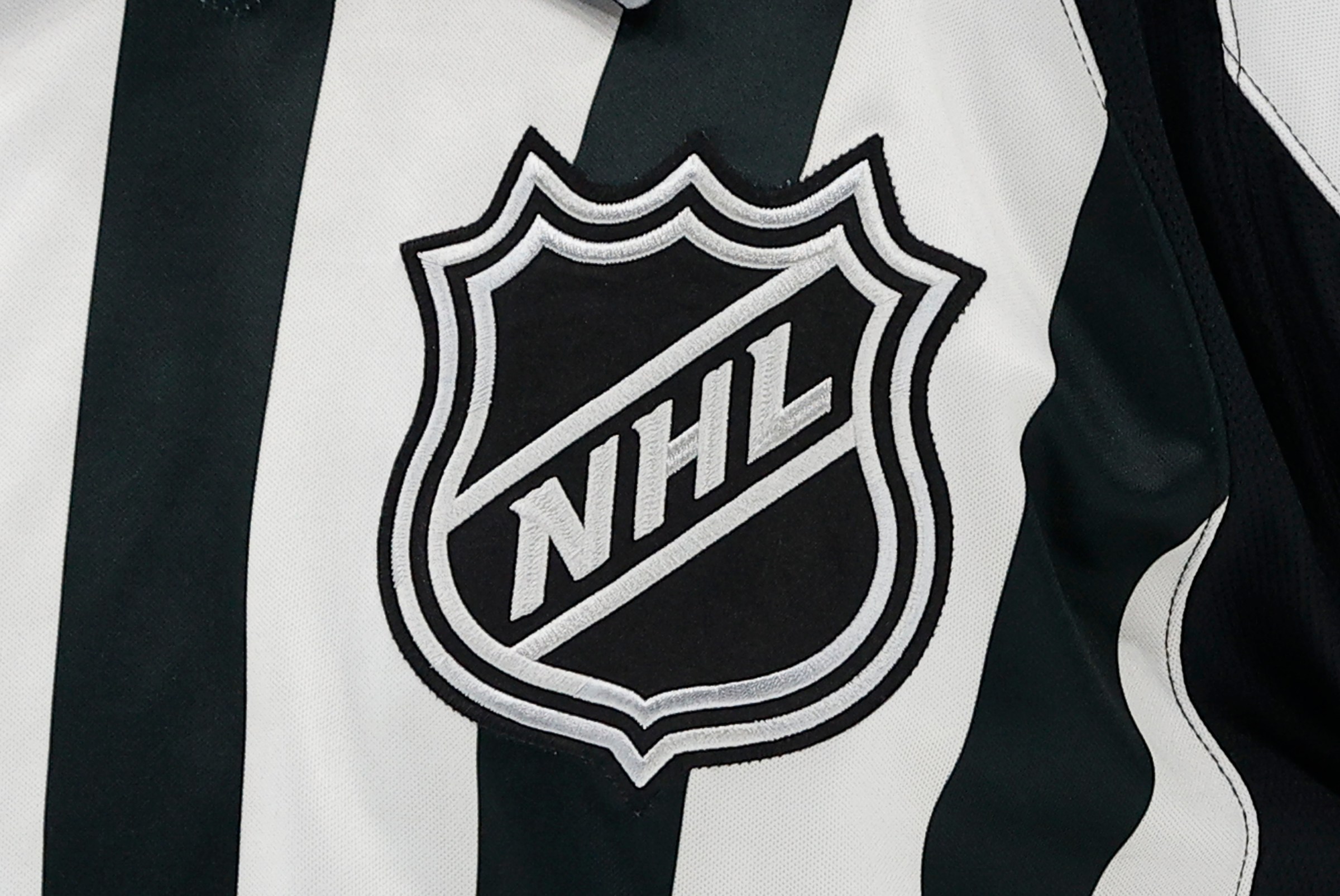 BOSTON, MA - MARCH 10: General view of the NHL logo on an officials jersey during the NHL game between Los Angeles Kings and Boston Bruins on March 10, 2026, at TD Garden in Boston, MA. (Photo by M. Anthony Nesmith/Icon Sportswire via Getty Images)