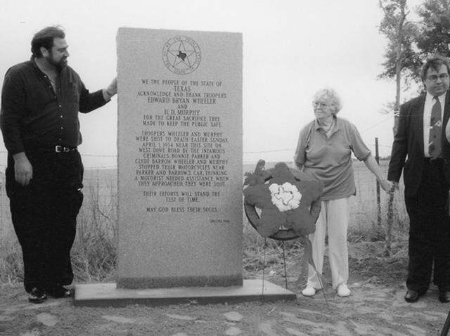 In 1996, a 6-foot historical marker commemorating E.B. Wheeler, 26, and H.D. Murphy, 24, was unveiled on Dove Road east of Texas 114.