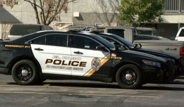 El Paso police vehicles sit outside a residence where a baby died.