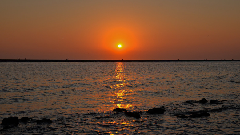 The sun rising over Quintana Beach in Texas.