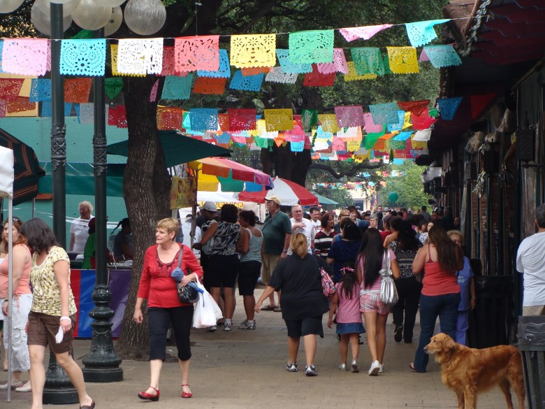 People stroll through Market Square downtown. 