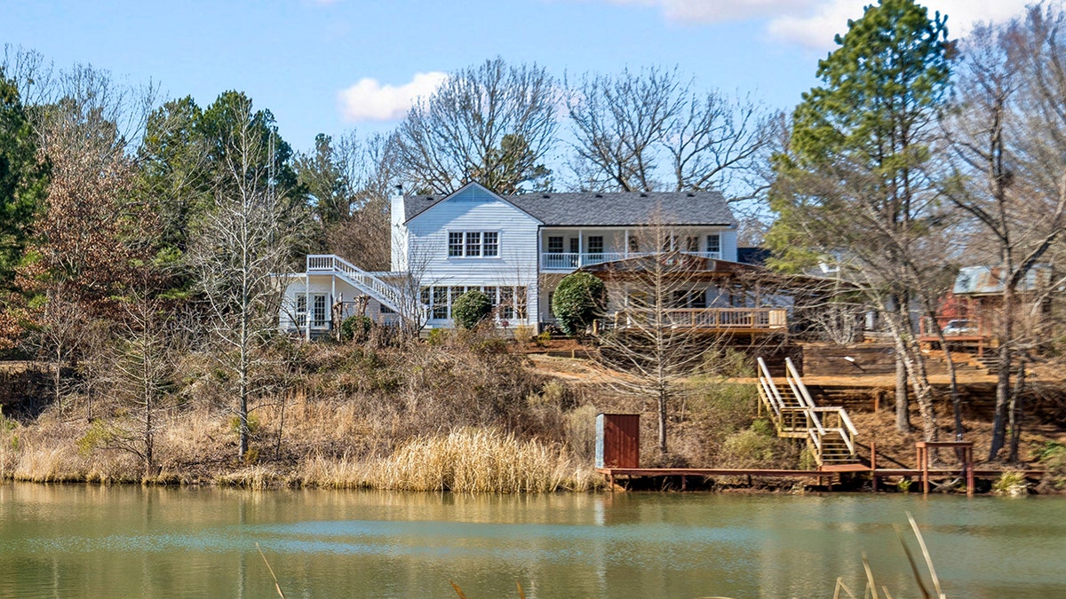The home also features access to a private dock on the pond.