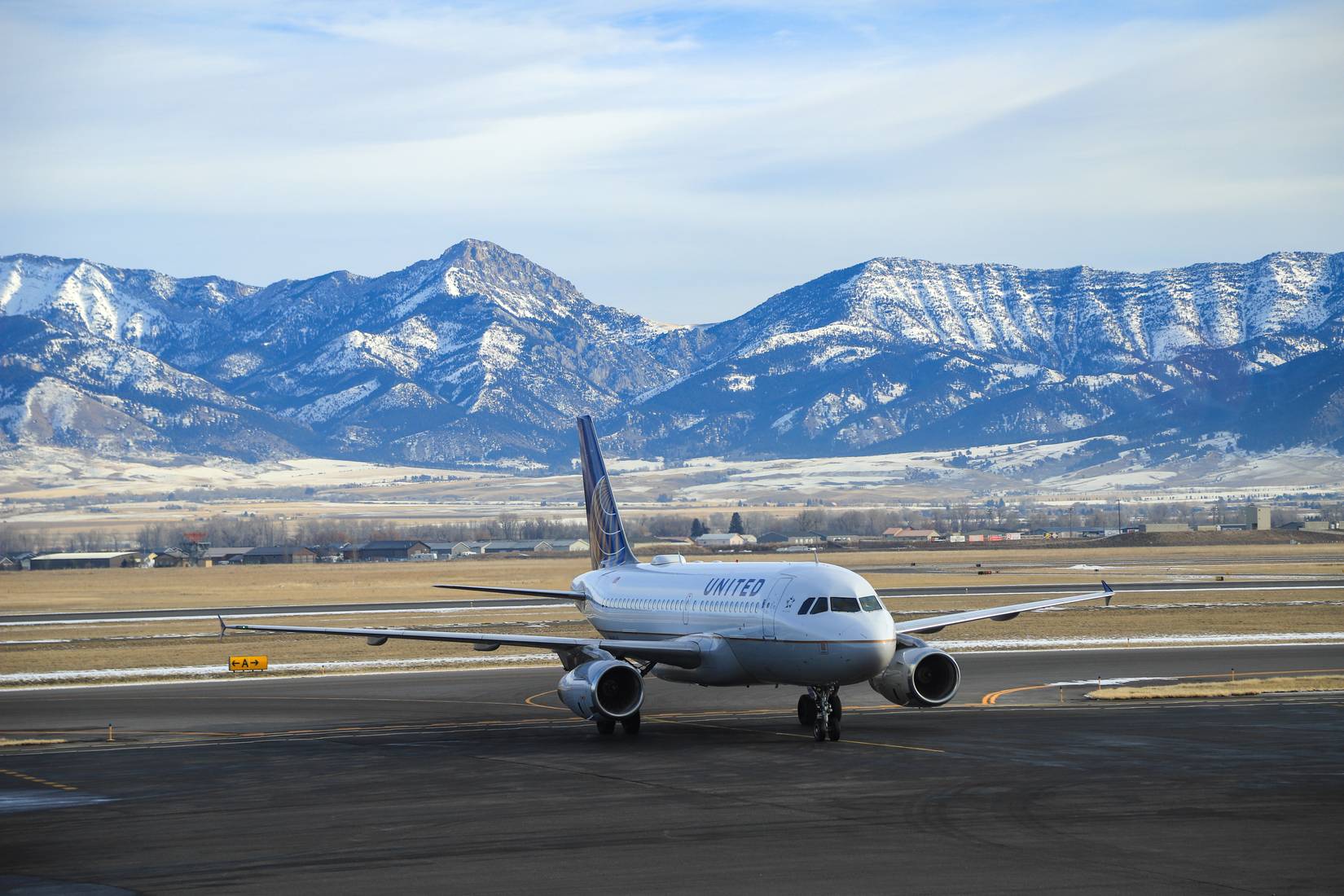 Jet airplane on the runway at the Bozeman Yellowstone International Airport, Belgrade, Montana