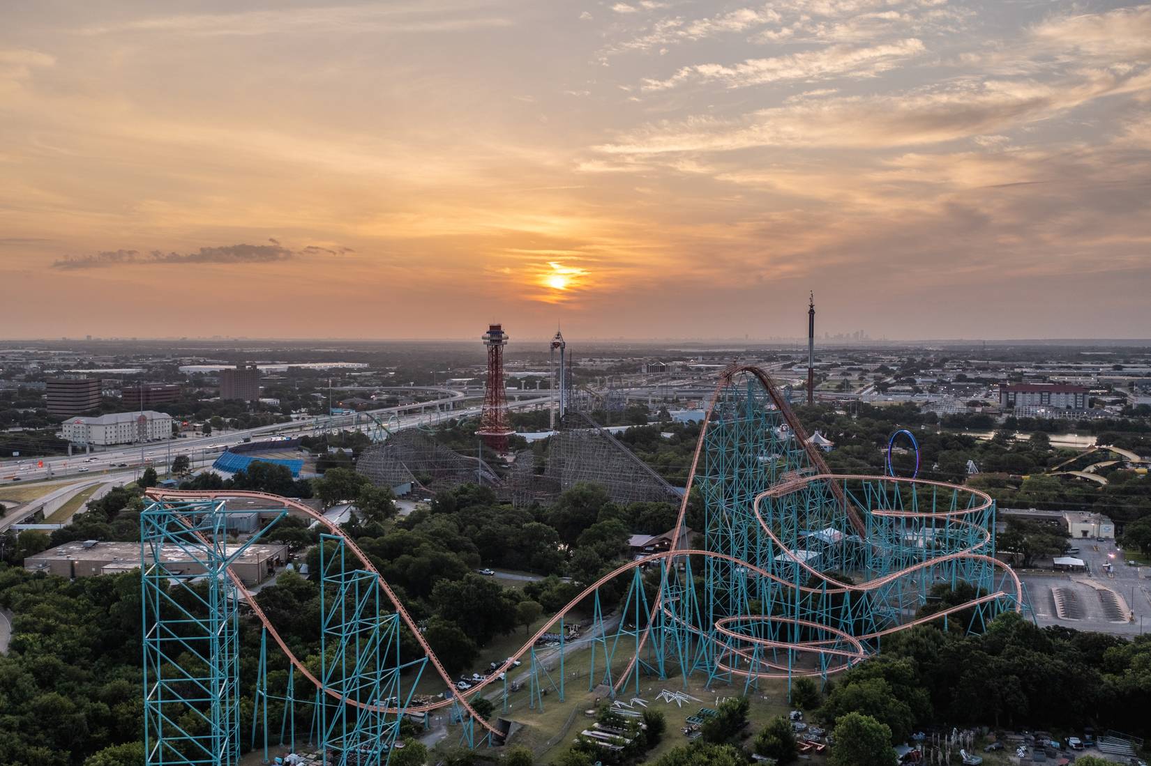 Rollercoaster at sunset at Six Flags Over Texas in Arlington, Texas