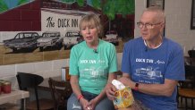 Susan Howard, left, and Todd Mathis, right, talk about the troubles faced by their restaurant, Duck Inn Again.