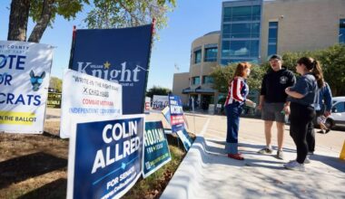 Texas election polling location with Colin Allred signs.