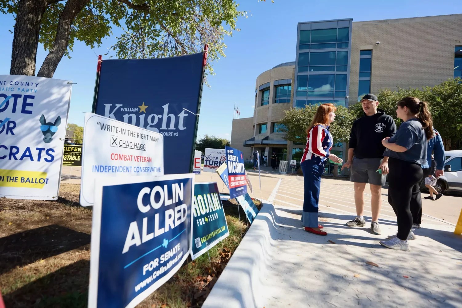 Texas election polling location with Colin Allred signs.