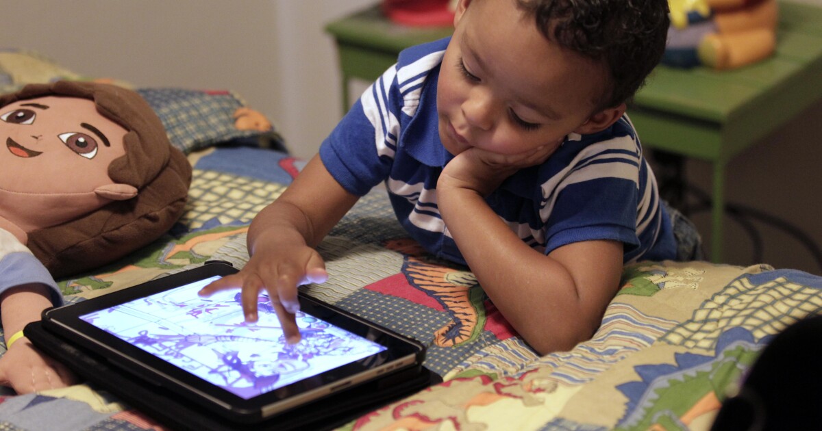 Lots of screentime can stunt kids' vocabularies and change the words they learn, SMU study finds