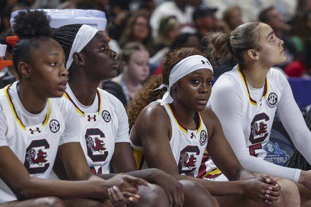 South Carolina’s Joyce Edwards, Madina Okot, Raven Johnson and Tessa Johnson react as the SEC Tournament game against Texas comes to a close at the Bon Secours Wellness Arena on Sunday, March 8, 2026. Texas defeated South Carolina 78-61.