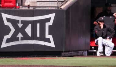 Texas Tech head coach Tim Tadlock sits next to the Big 12 Conference logo during a non-conference Division I baseball game, Wednesday, March 5, 2025, at Dan Law Field.