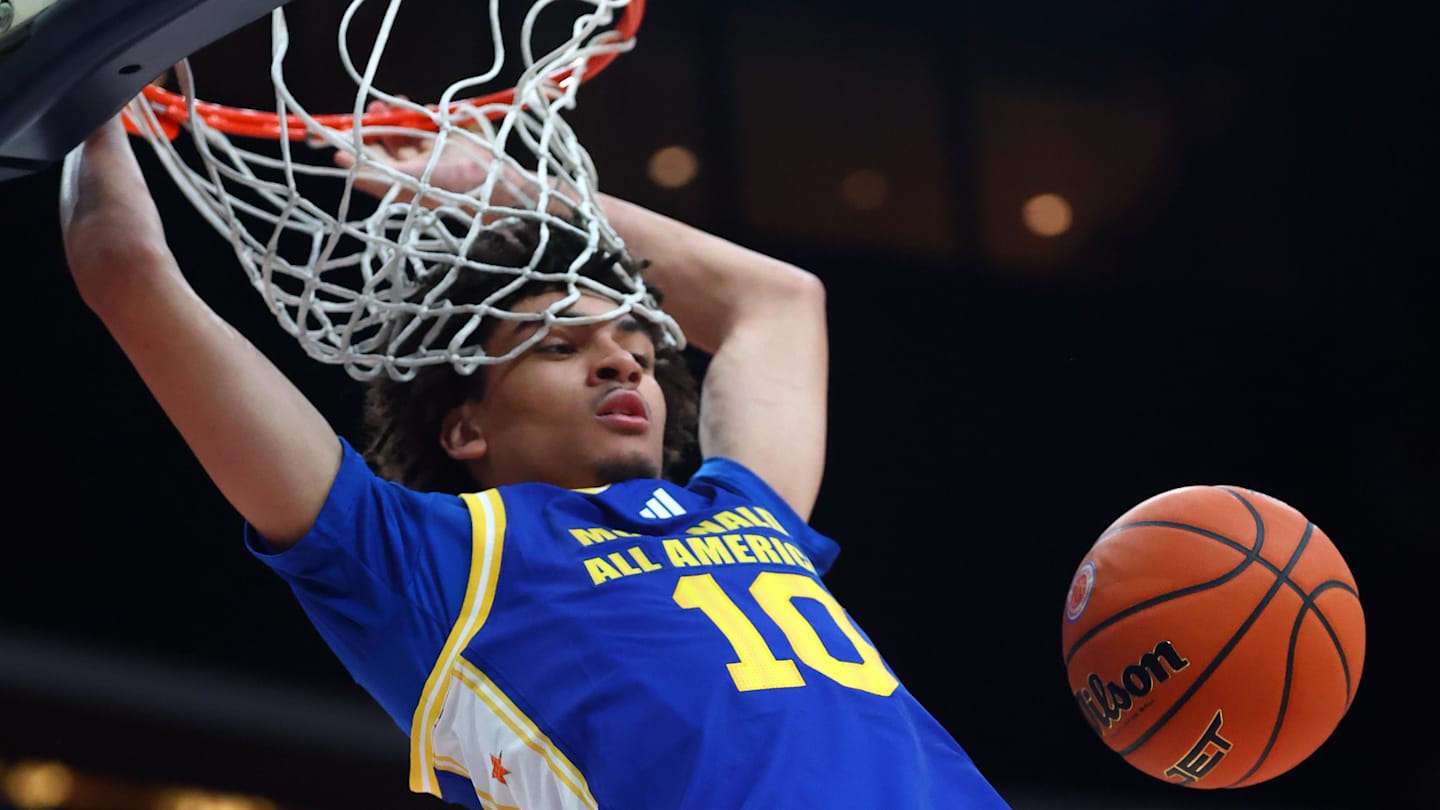 Mar 31, 2026; Glendale, AZ, USA; Austin Goosby (10) dunks the ball during the McDonald's All American Boys Game at Desert Diamond Arena.