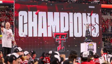 Texas Tech head coach Joey McGuire stands on stage after the Red Raiders defeated BYU 34-7 in the Big 12 Championship football game, Saturday, Nov. 6, 2025, at AT&T Stadium in Arlington.