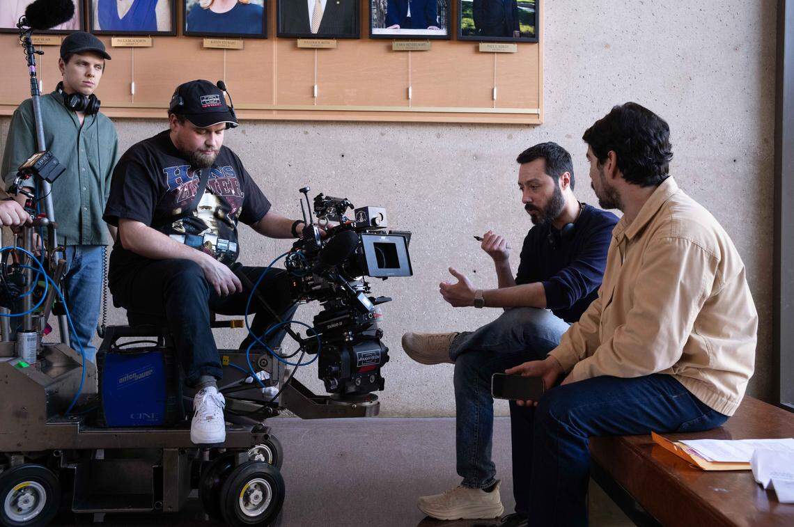 Director Merced Elizondo (dark blue shirt) and actor Raúl Castillo (khaki jacket) on the set of “And Then Everything Turned Itself Inside Out.”