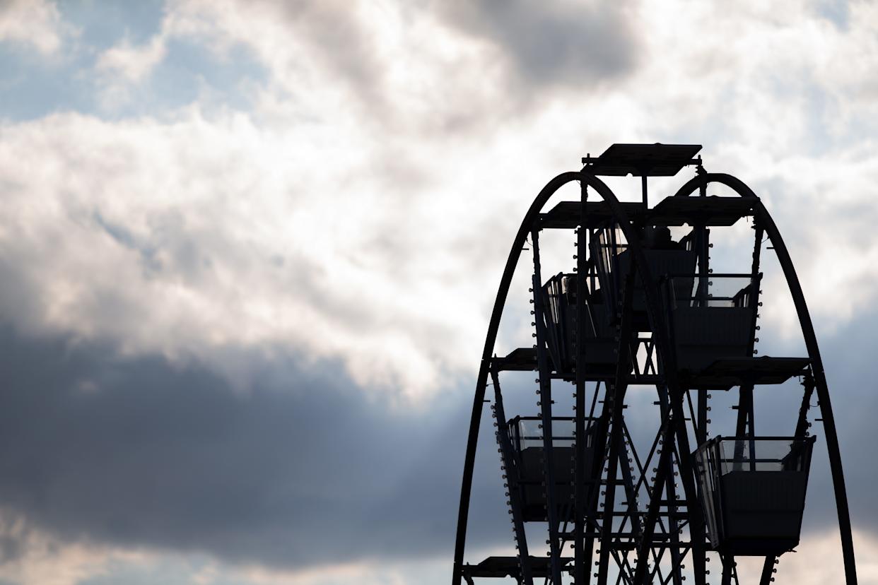 People ride the Ferris wheel at the annual Buc Days Carnival in downtown Corpus Christi on May 9, 2025.
