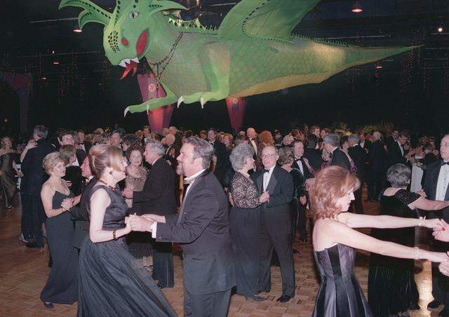 Jan. 9, 1999: Jewel Charity Ball attendees dance under the Emerald Dragon at the Amon Carter Jr. Exhibits Hall. The Emerald Dragon was later sold to a high school for a mascot.