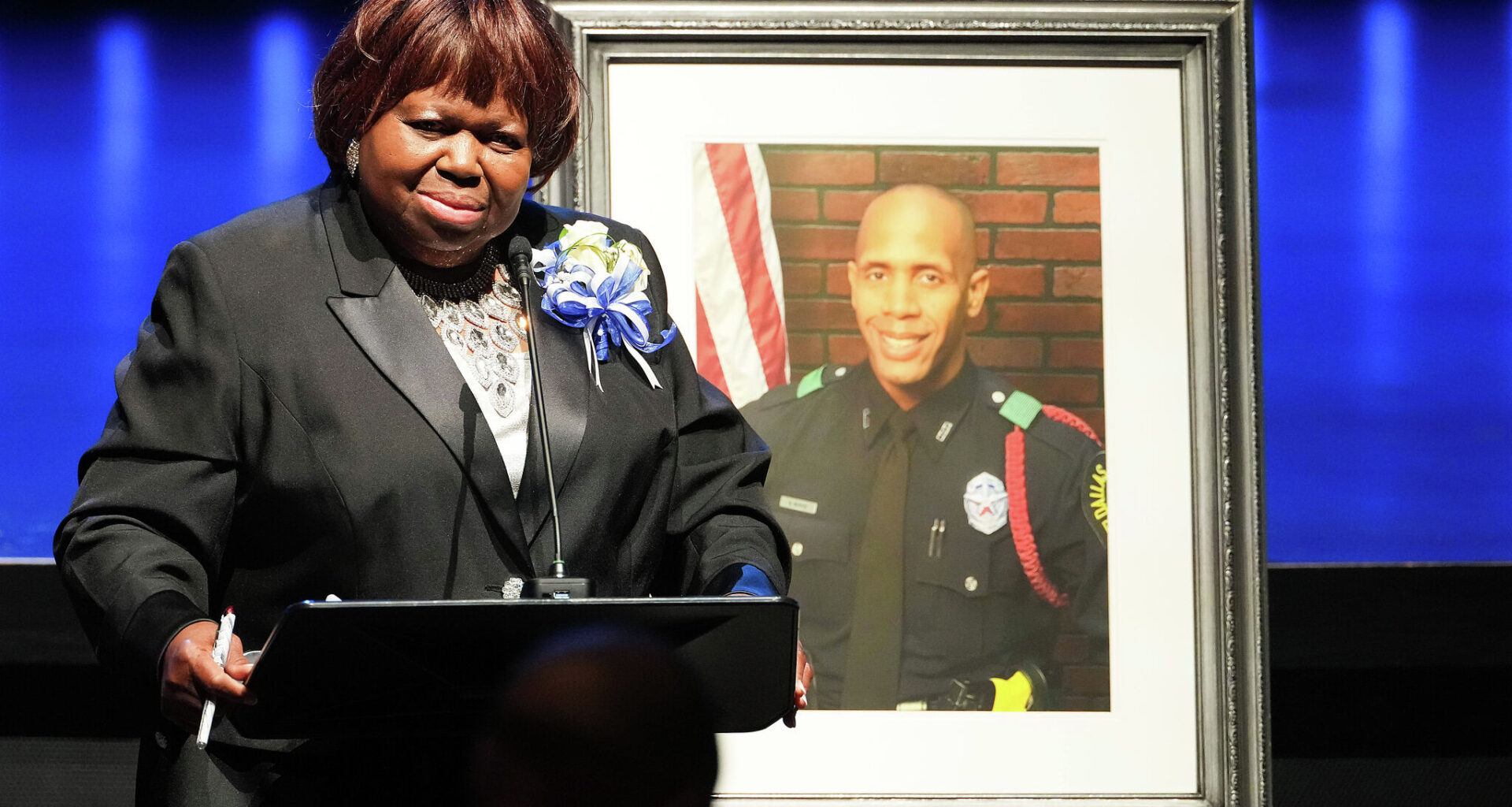Mother of officer killed in shooting sues alleged gunman's parents