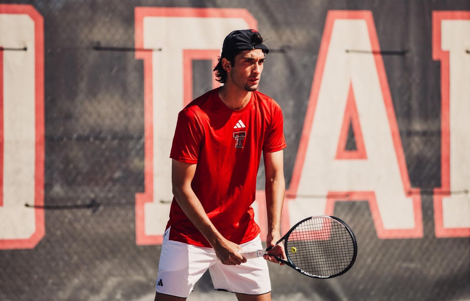 Thiago Guglieri waiting to serve the ball. Texas Tech vs UTSA Men's Tennis on March 22, 2026. (Photo by Joseph Cabrera/ Texas Tech Athletics)