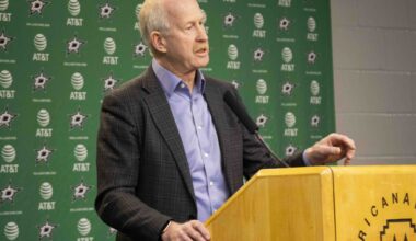 A ball rests in foul territory at the Texas Rangers take batting practice before an exhibition baseball game against the Kansas City Royals at Globe Life Field on Monday, March 23, 2026, in Arlington.