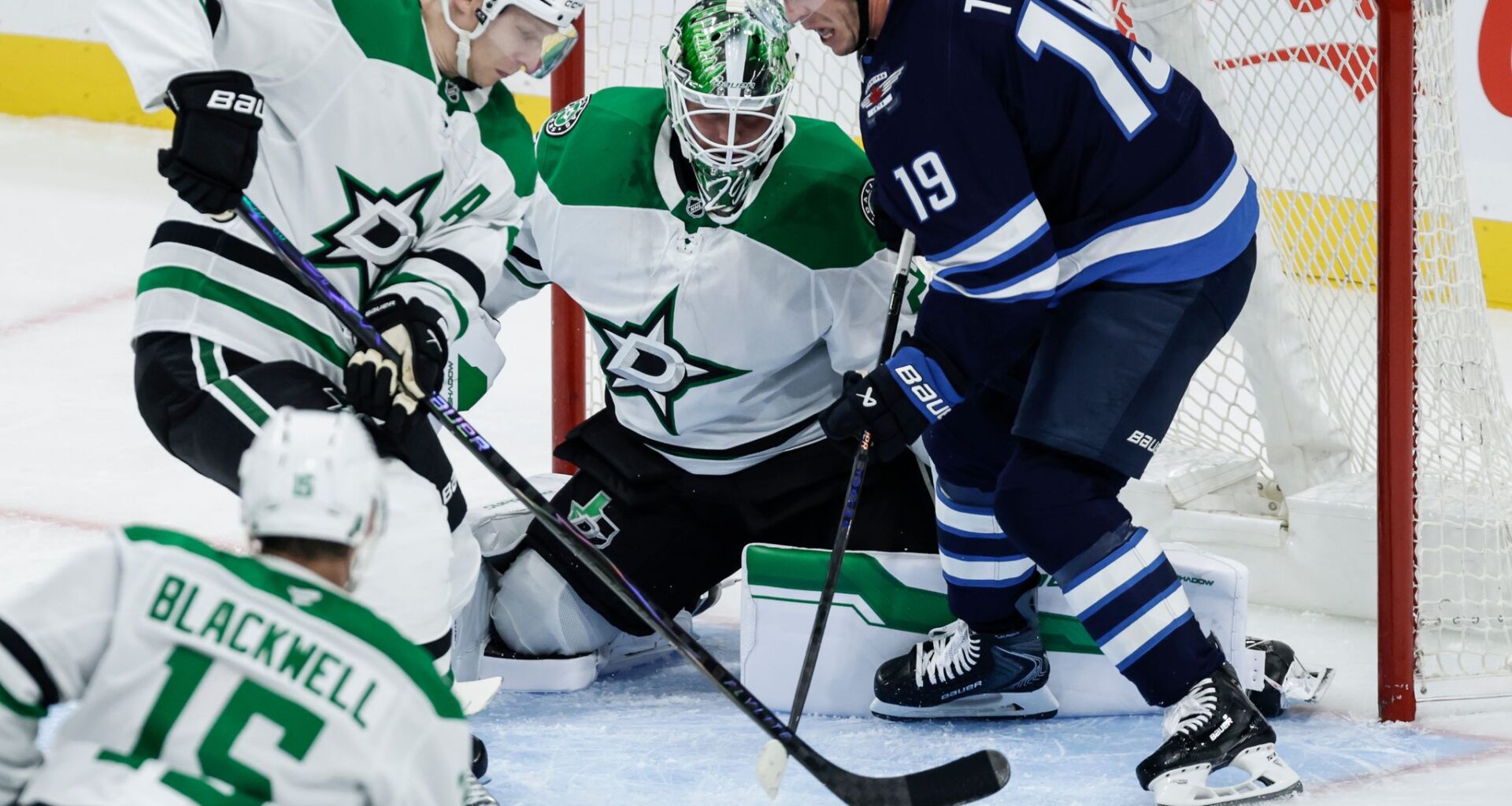 Dallas Cowboys fan Kamorree Wyrick (right) breaks away with the ball as kids played football during a Cowboys draft party on the Ford Center Plaza at The Star in Frisco, April 25, 2025.