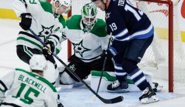 Dallas Cowboys fan Kamorree Wyrick (right) breaks away with the ball as kids played football during a Cowboys draft party on the Ford Center Plaza at The Star in Frisco, April 25, 2025.