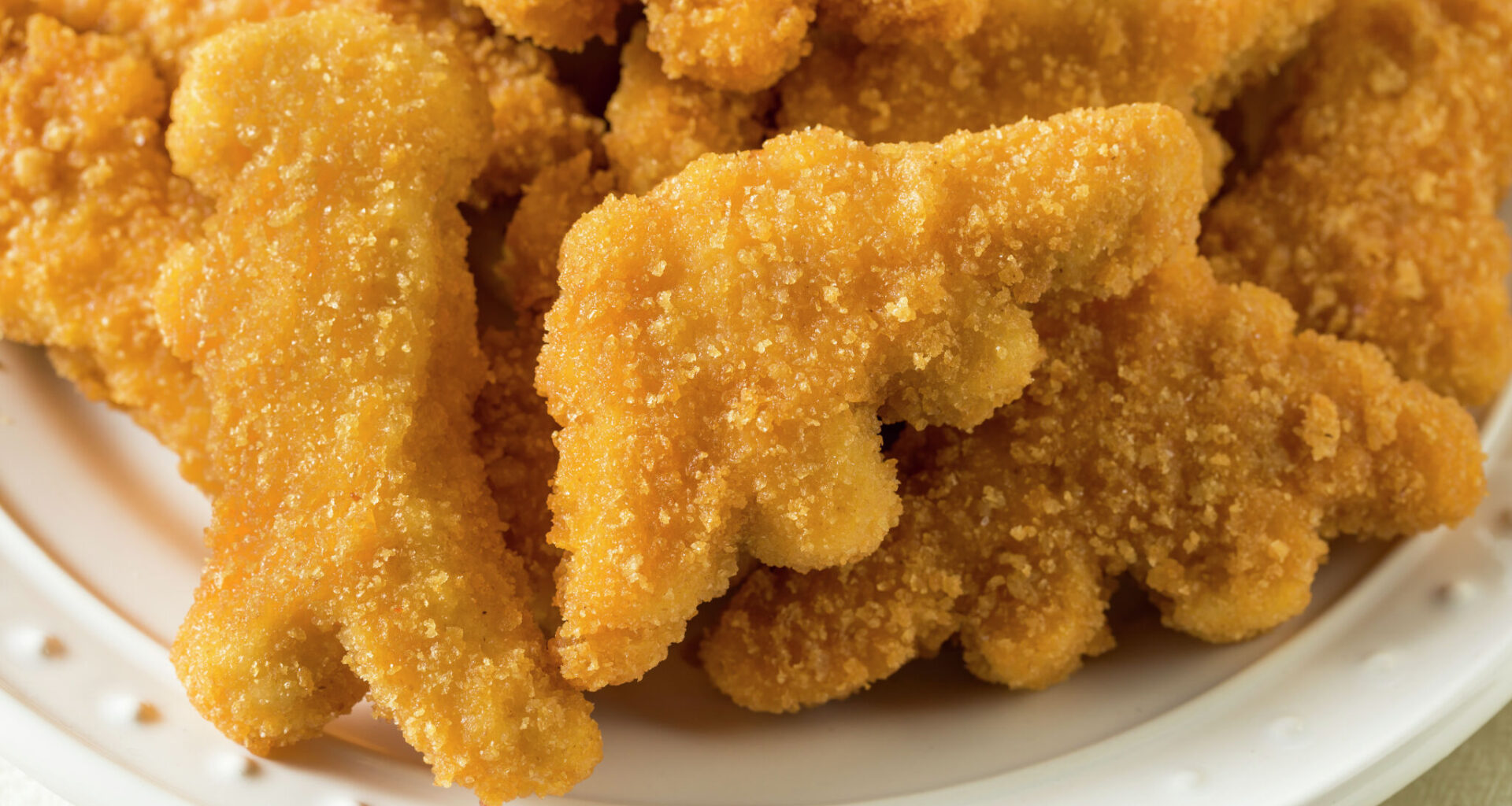 Frozen, dinosaur-shaped chicken nuggets sold under the Great Value brand may contain lead.