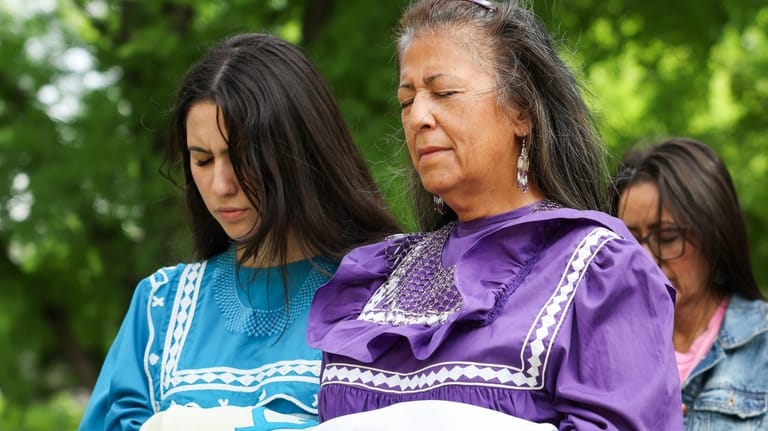 Selah Smith, member of the Choctaw tribe, left, and Nancy...