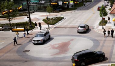An official vote center sign is seen at Oak Lawn Branch Library in Dallas.