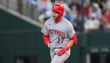 Reds beat Rangers 5-3 in their 1st road game with 3 homers, the last in the 9th