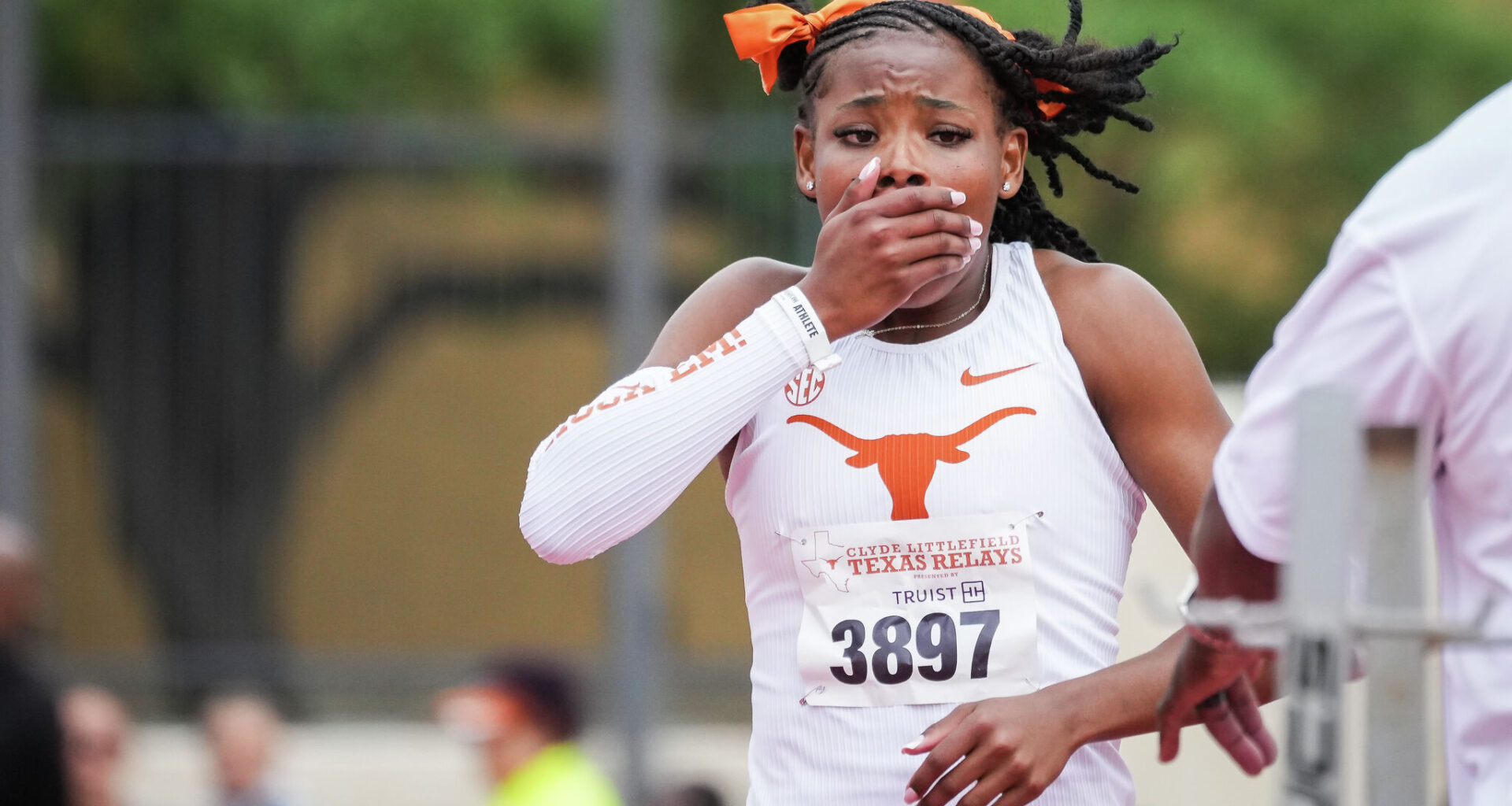 Longhorns freshman Abigail Wolfe looks strong in 100 run