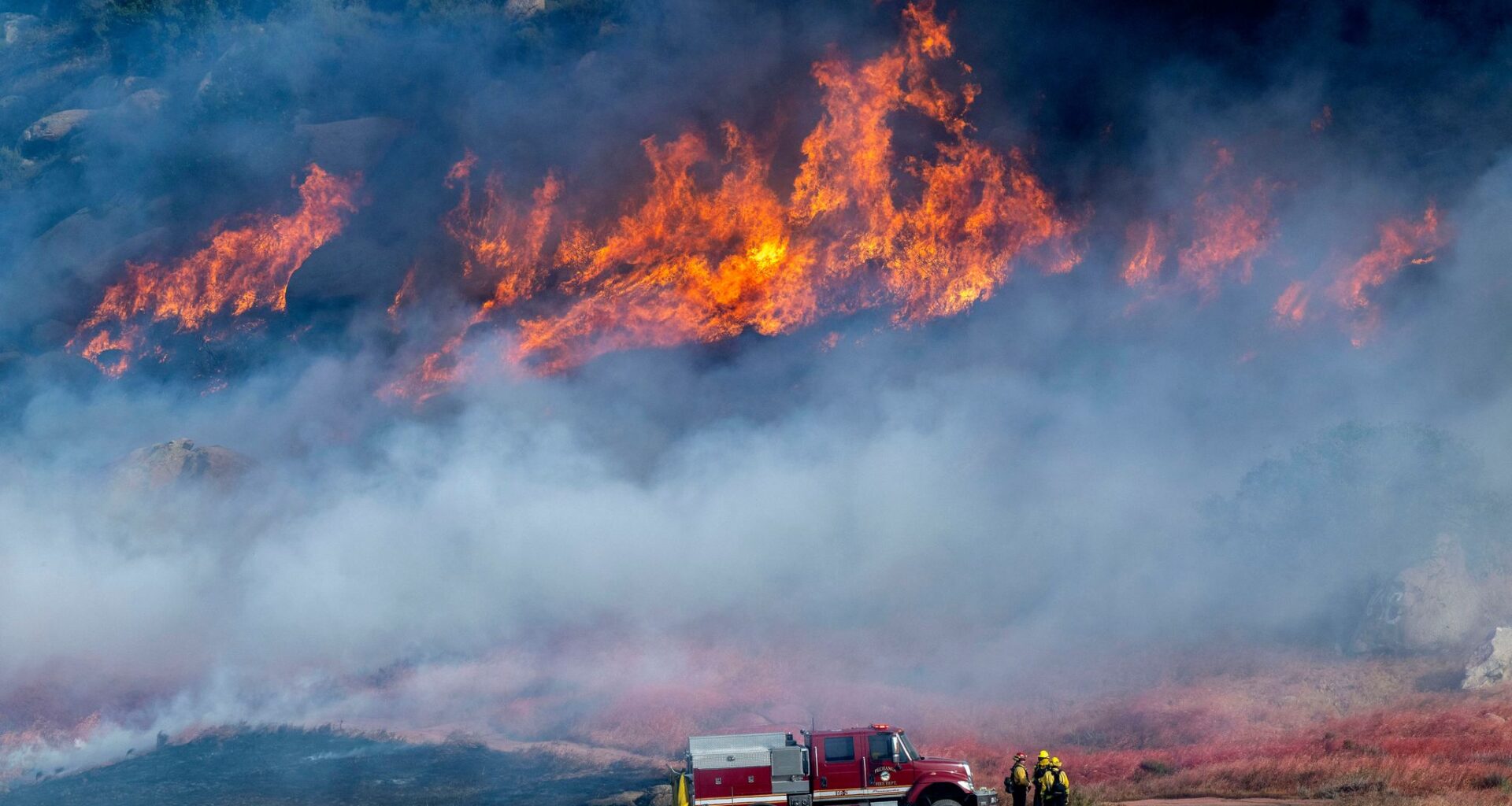 Crews battle fast-growing wildfire in windy Southern California that's forced some to evacuate