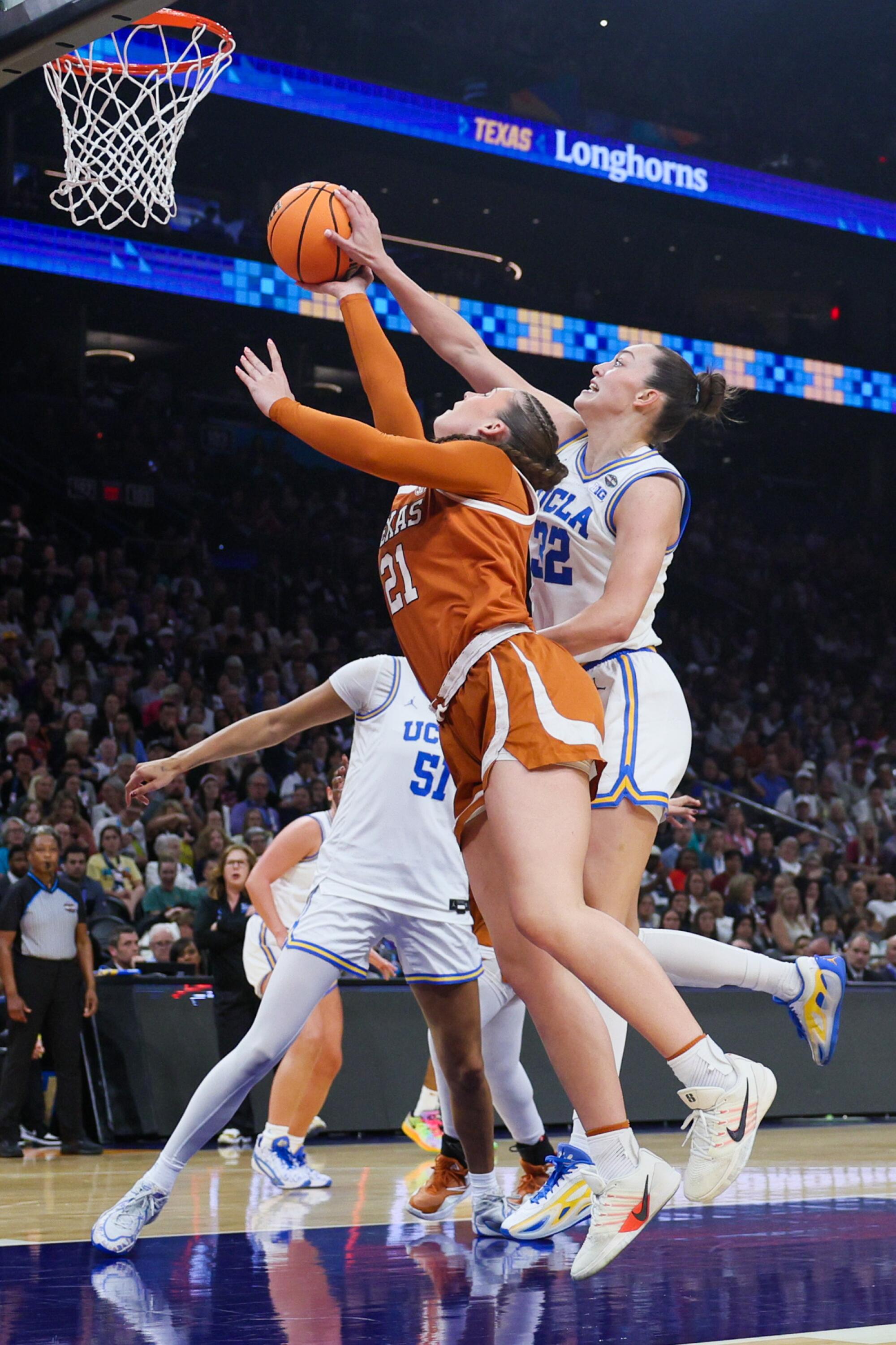 UCLA forward Angela Dugalic blocks a layup attempt by Texas guard Ashton Judd during thier Final Four game Friday.