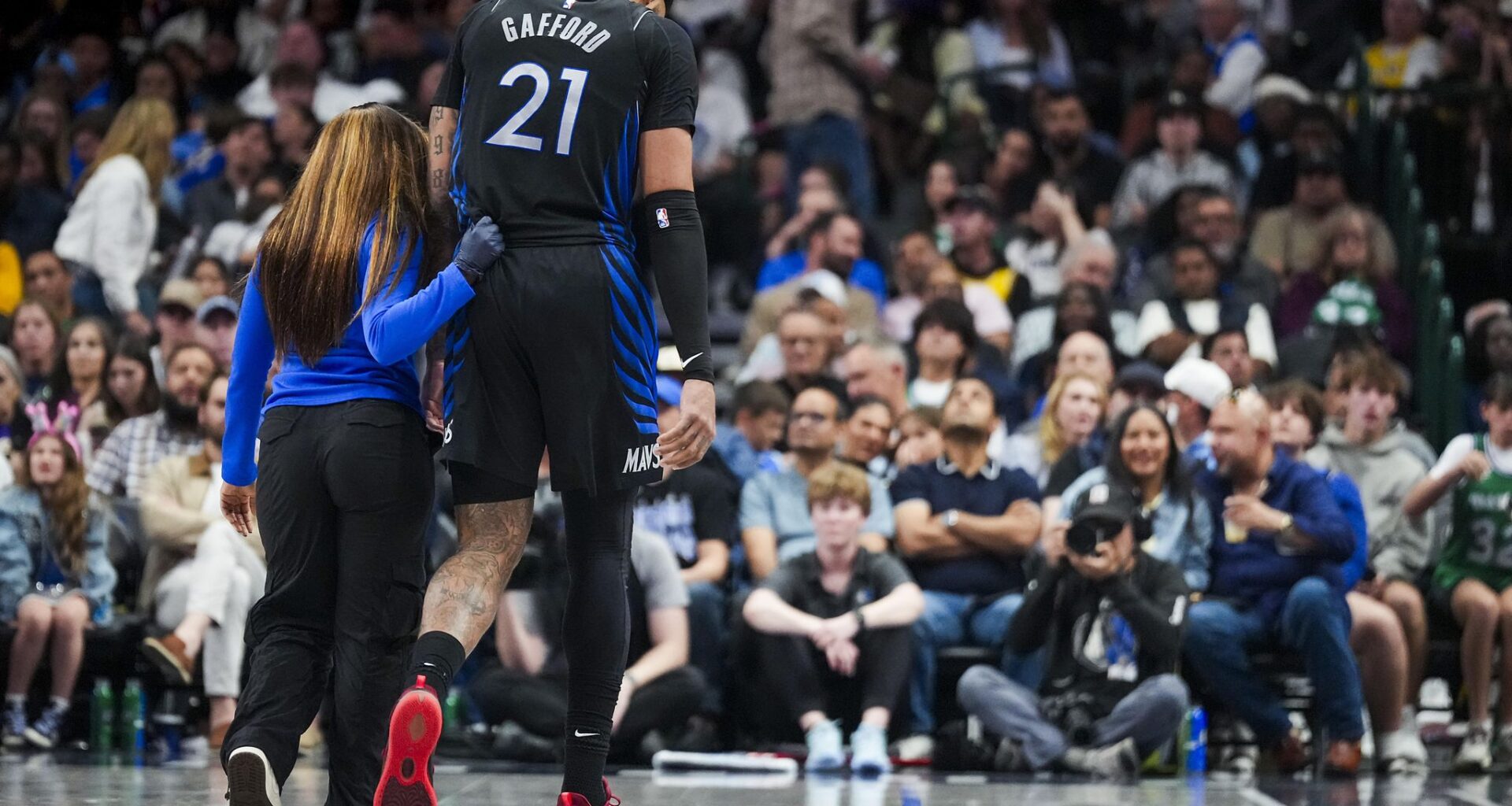 Dallas Mavericks forward Cooper Flagg celebrates after a Mavericks score during the second half of an NBA basketball game against the Los Angeles Lakers at American Airlines Center on Sunday, April 5, 2026, in Dallas.