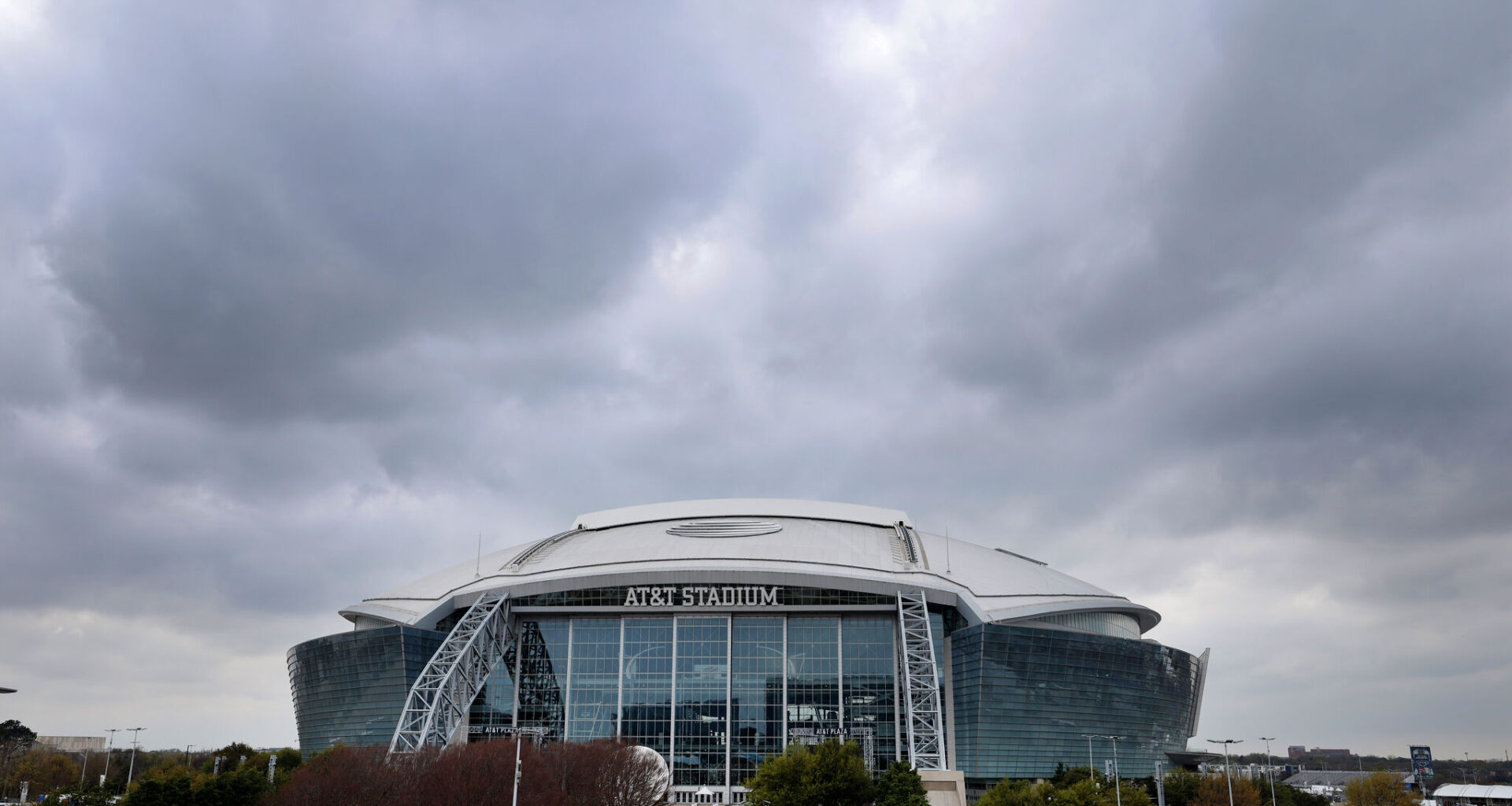 Attendees offer their respect to a makeshift memorial for late Athena Strand after a memorial service at First Baptist Church of Cottondale in Paradise, Texas, on Tuesday, Dec. 6, 2022.