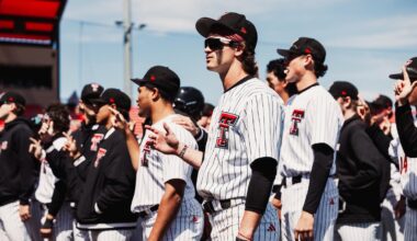 Catcher Matt Quintanar and Infielder Tracer Lopez smile for the camera after Tech's 11-2 win over UH