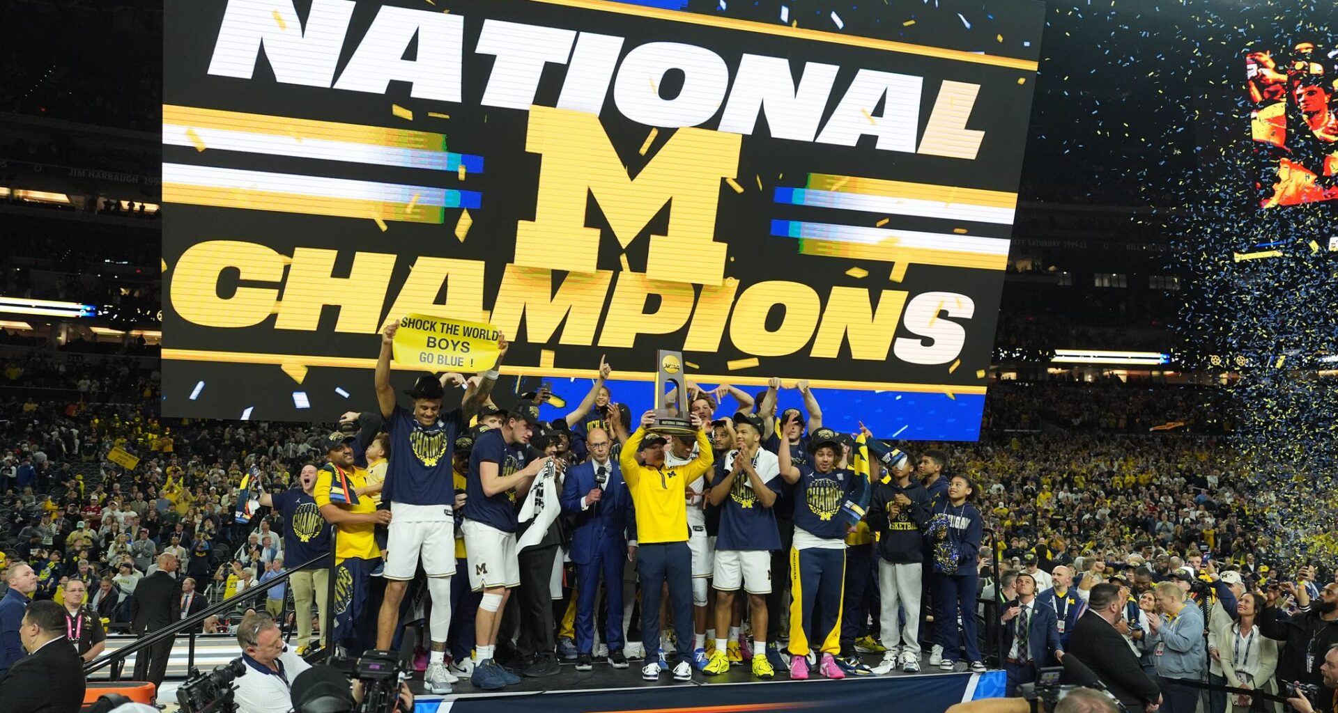 Michigan muscles its way to program's 2nd national title, beating stubborn UConn 69-63