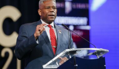 Workers at the Cimarron Firearms set up a display case with old west reproduction revolvers as exhibitors get set up for the opening of the NRA Annual Meetings and Exhibits at the Kay Bailey Hutchison Convention Center on Thursday, May 3, 2018, in Dallas. (Smiley N. Pool/The Dallas Morning News)