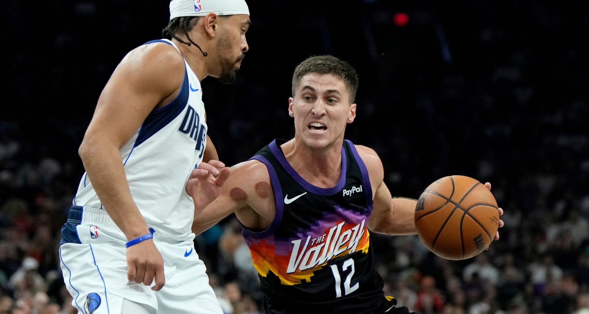 Devin Booker scores 37, Suns clinch No. 7 spot in West with a 112-107 win