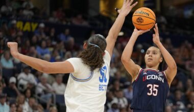 Texas Rangers' Jake Burger (21) is congratulated by Josh Jung, front left, after hitting a three-run home run during the first inning of a baseball game against the Athletics, Monday, April 13, 2026, in West Sacramento, Calif.
