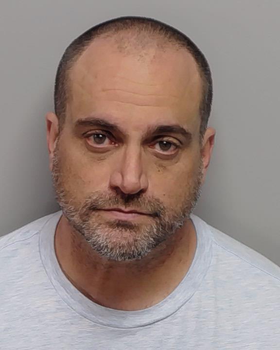 Teacher fails breathalyzer, threatens school shooting