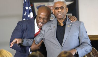 Rep. Wesley Hunt, R-Texas, left, greets Allen West, chair of the Dallas County Republican Party, as he arrives at the party's headquarters to attend a meet and greet event to kick off early voting in the U.S. Senate Republican primary, Monday, Feb. 16, 2026, in Dallas .
