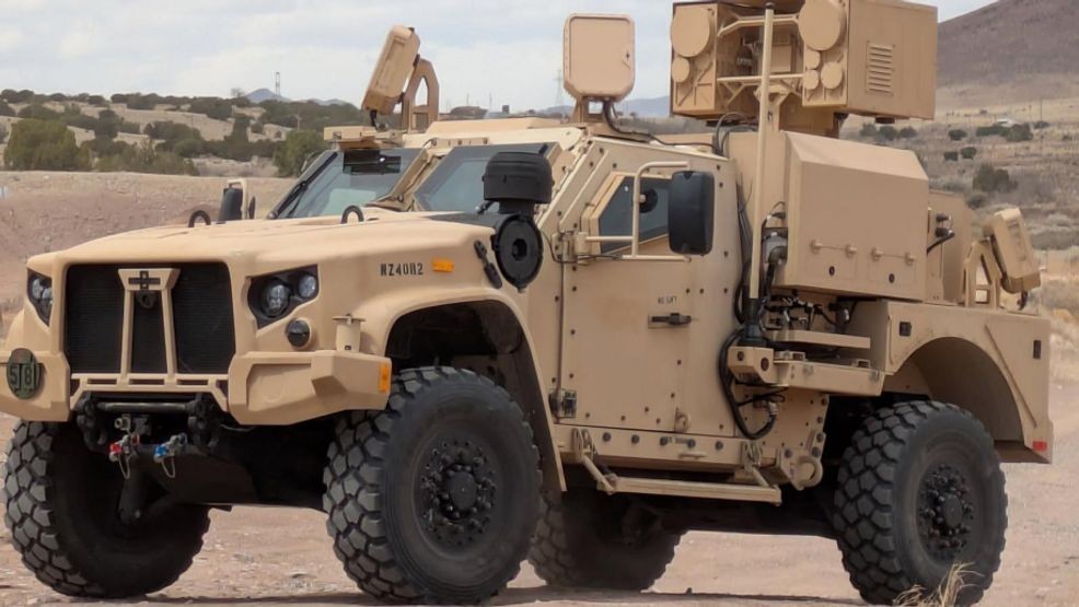 The LOCUST Laser Weapon System (LWS) integrated on an Oshkosh Joint Light Tactical Vehicle (JLTV) was delivered to the U.S. Army Rapid Capabilities and Critical Technologies Office (RCCTO) as part of the second increment of the Army Multi-Purpose High Energy Laser (AMP-HEL) prototyping effort. [Credit: AV, 2025]
