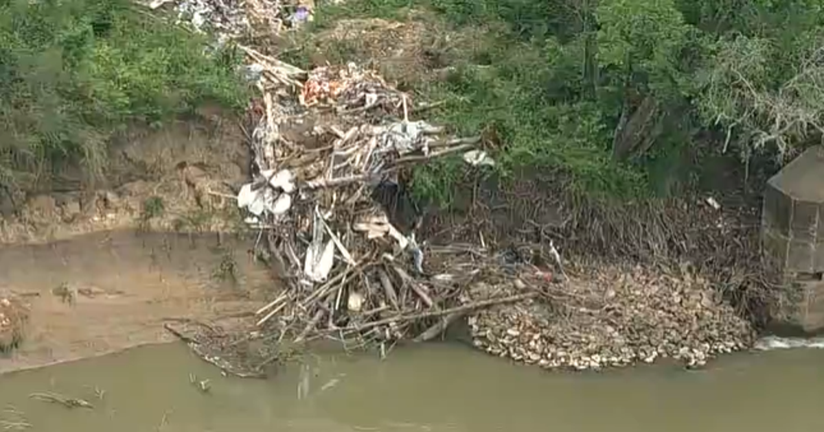 Dallas still working on plan to clear large illegal trash dump on Trinity River