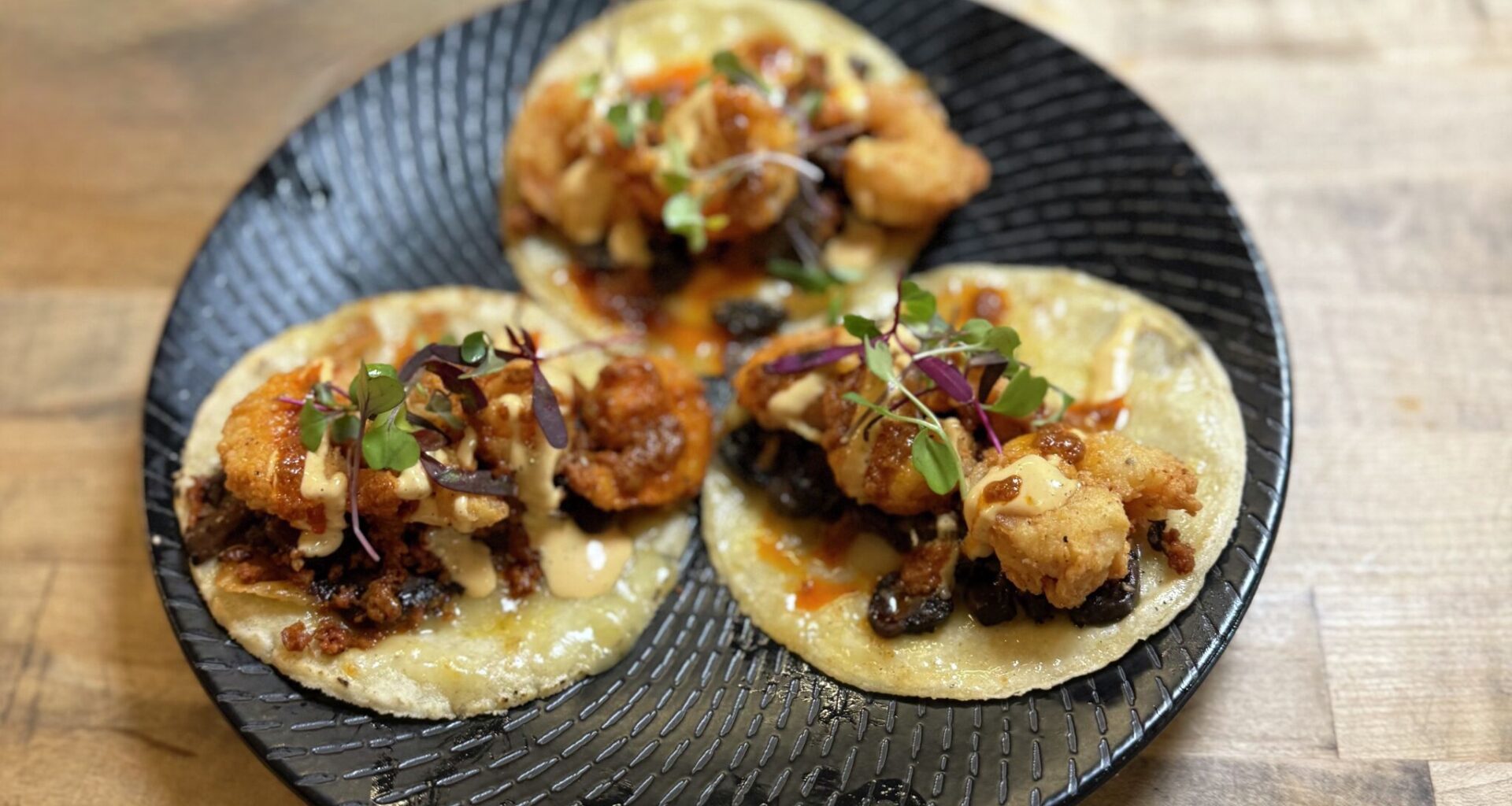 A plate of tacos from Amar.