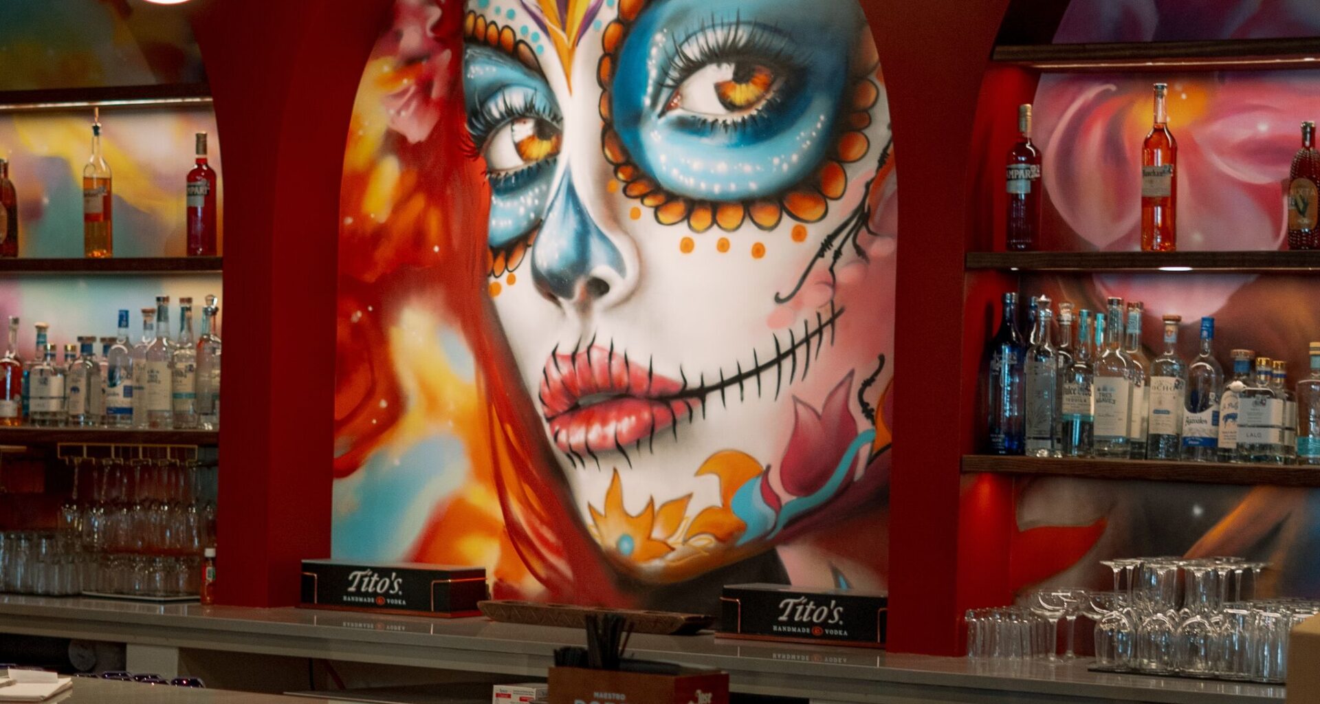 The mural behind the bar at Tres Arcos.