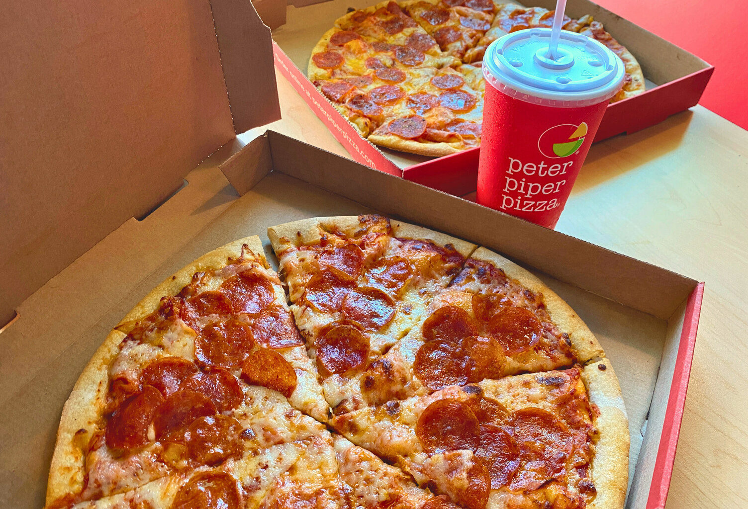 Peter Piper Pizza has a double-up deal that comes with two large pizzas and a drink. 