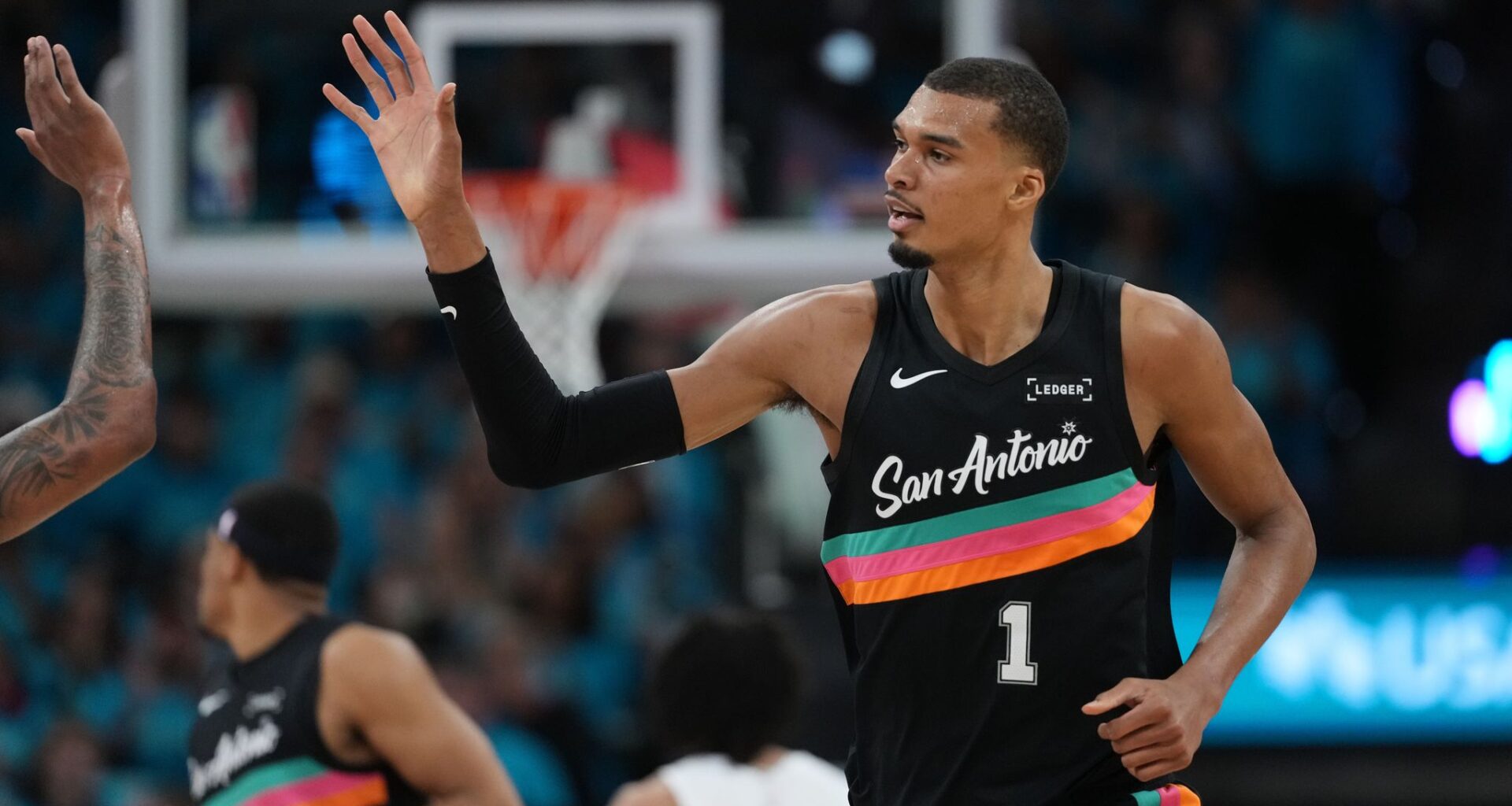 Wembanyama scores 35 points in playoff debut as Spurs roll past Trail Blazers 111-98