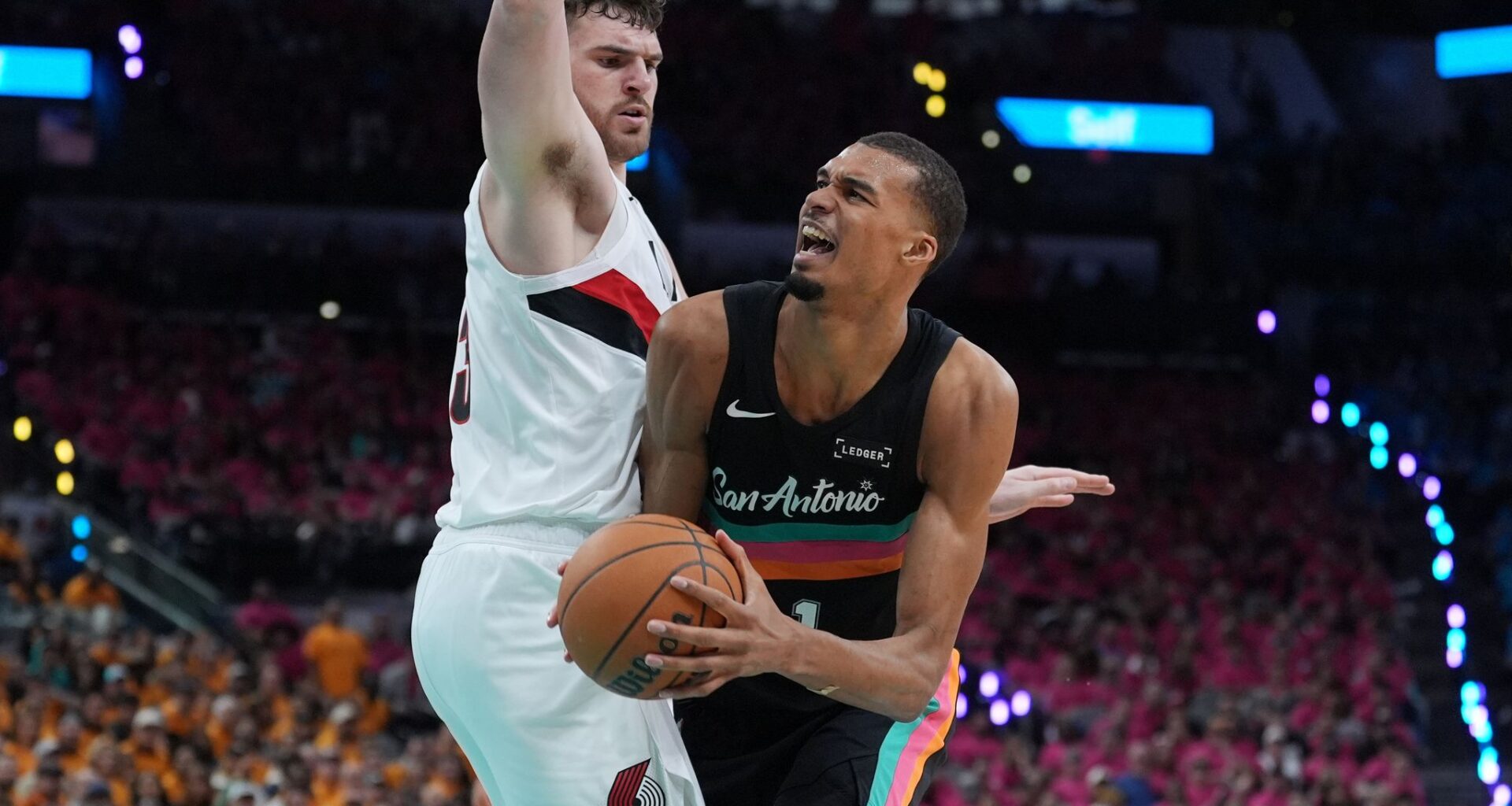 Wembanyama revels in safety of Hall of Famers, fans in playoff debut as Spurs top Blazers