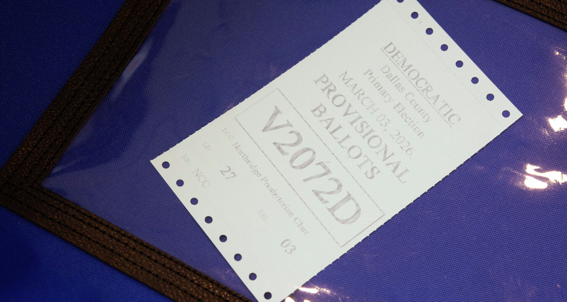 An official vote center sign is seen at Oak Lawn Branch Library on the first day of early voting, Tuesday, Feb. 17, 2026, in Dallas.