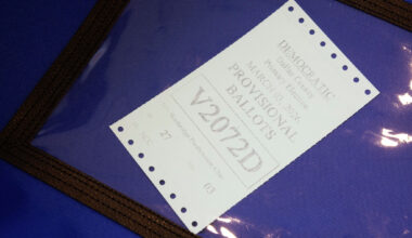 An official vote center sign is seen at Oak Lawn Branch Library on the first day of early voting, Tuesday, Feb. 17, 2026, in Dallas.